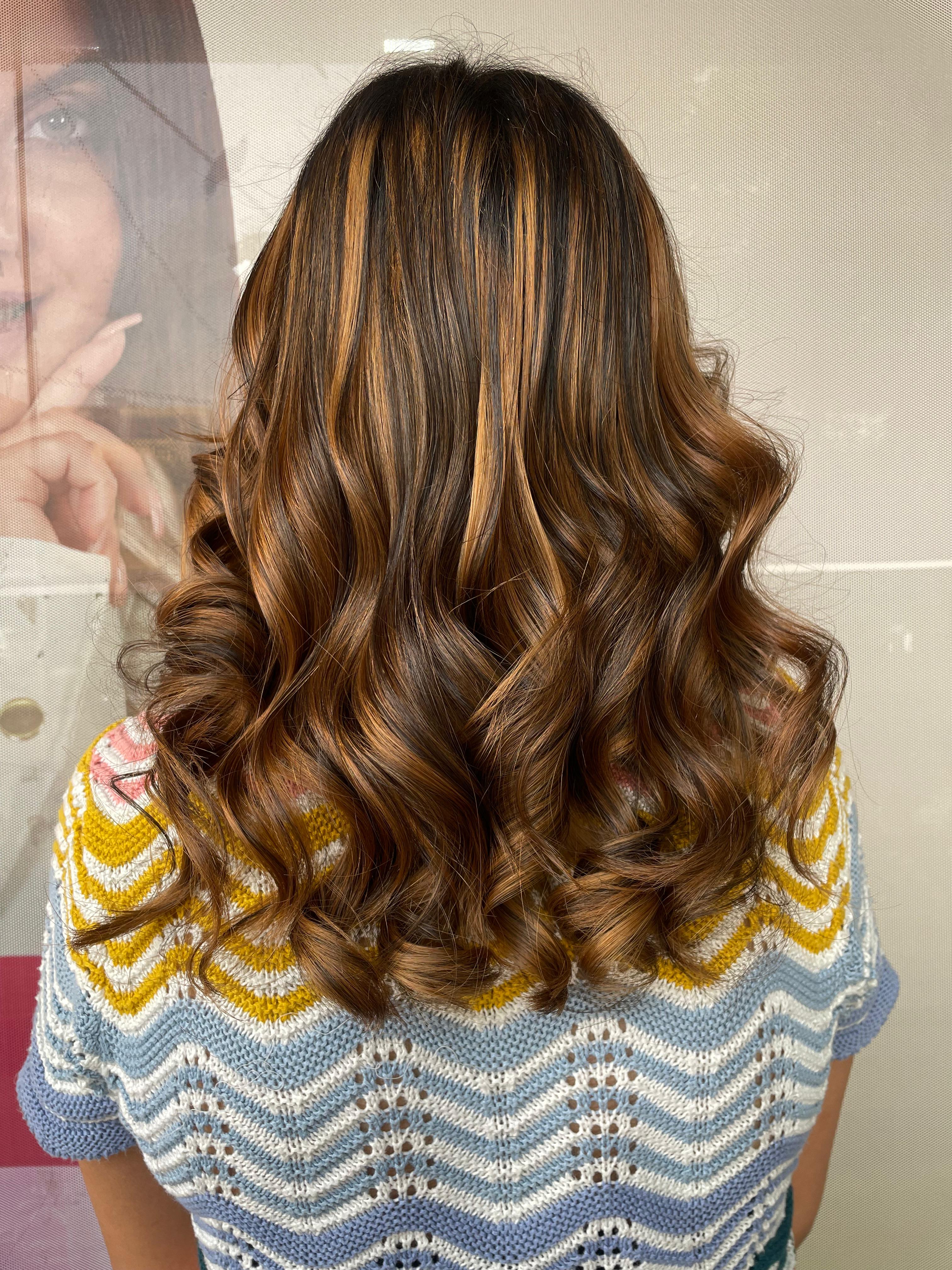 Caramel balayage with voluminous curls