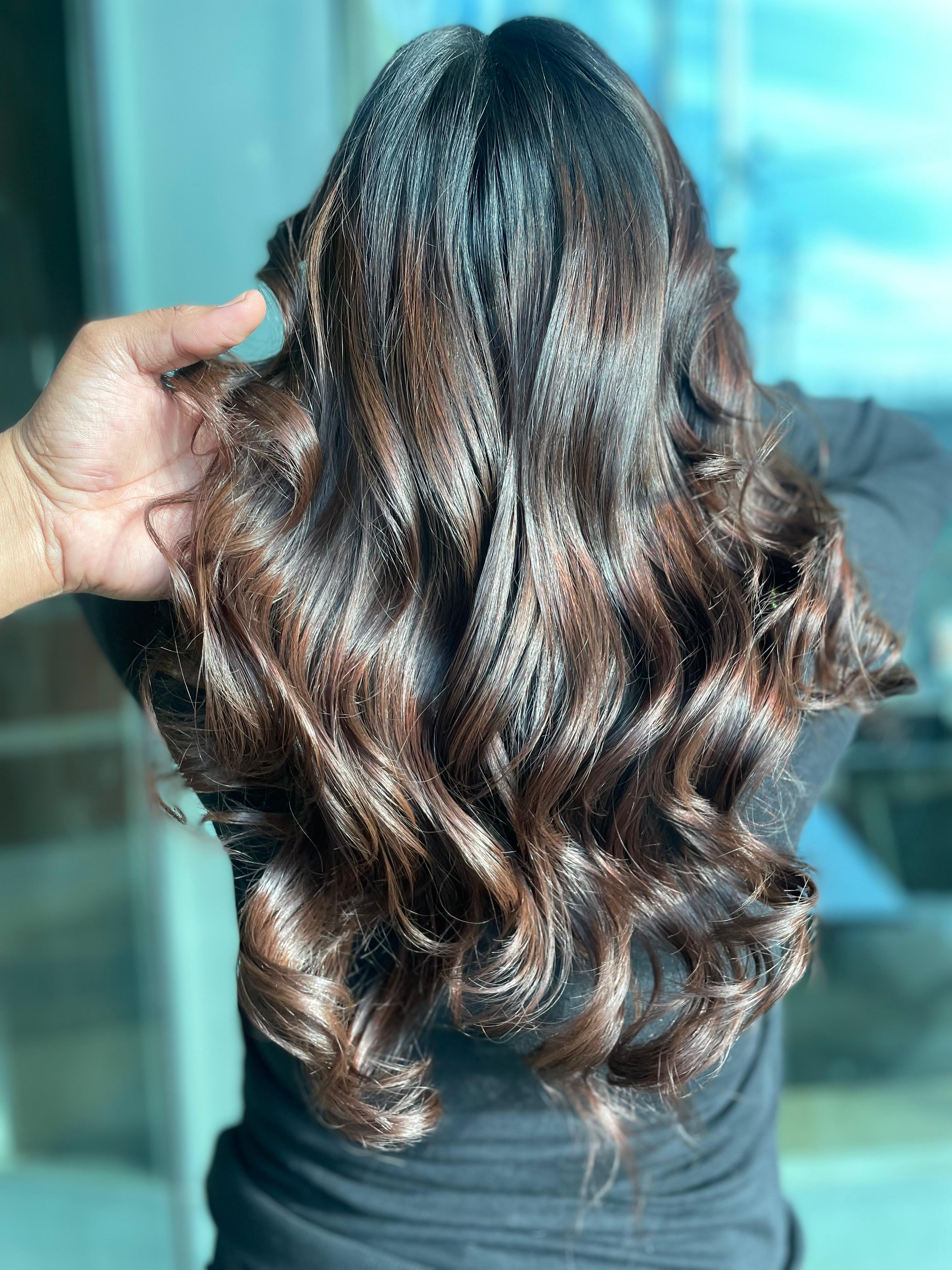 Dark chocolate curls with blue-teal backdrop