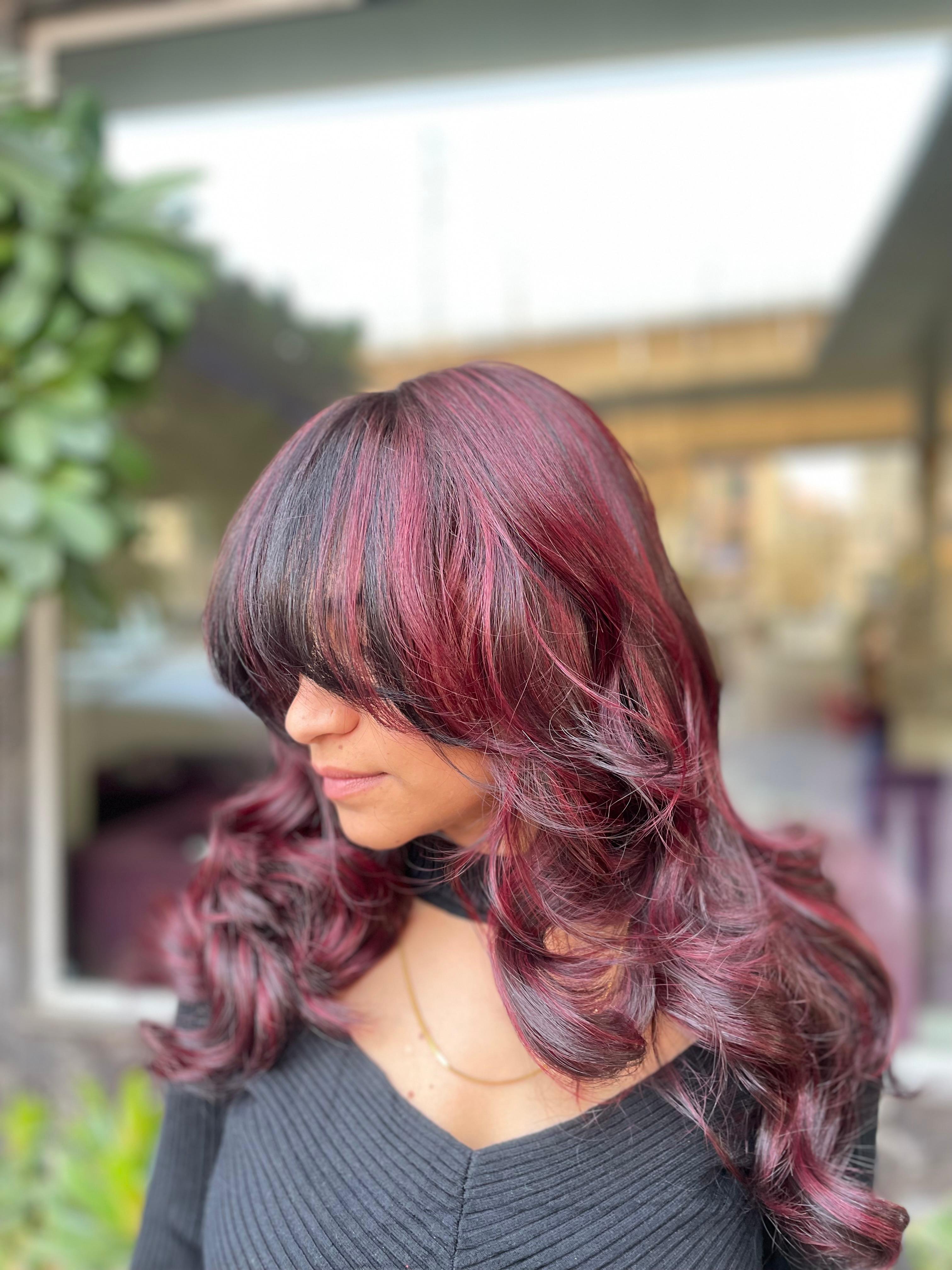 Bold magenta-burgundy highlights