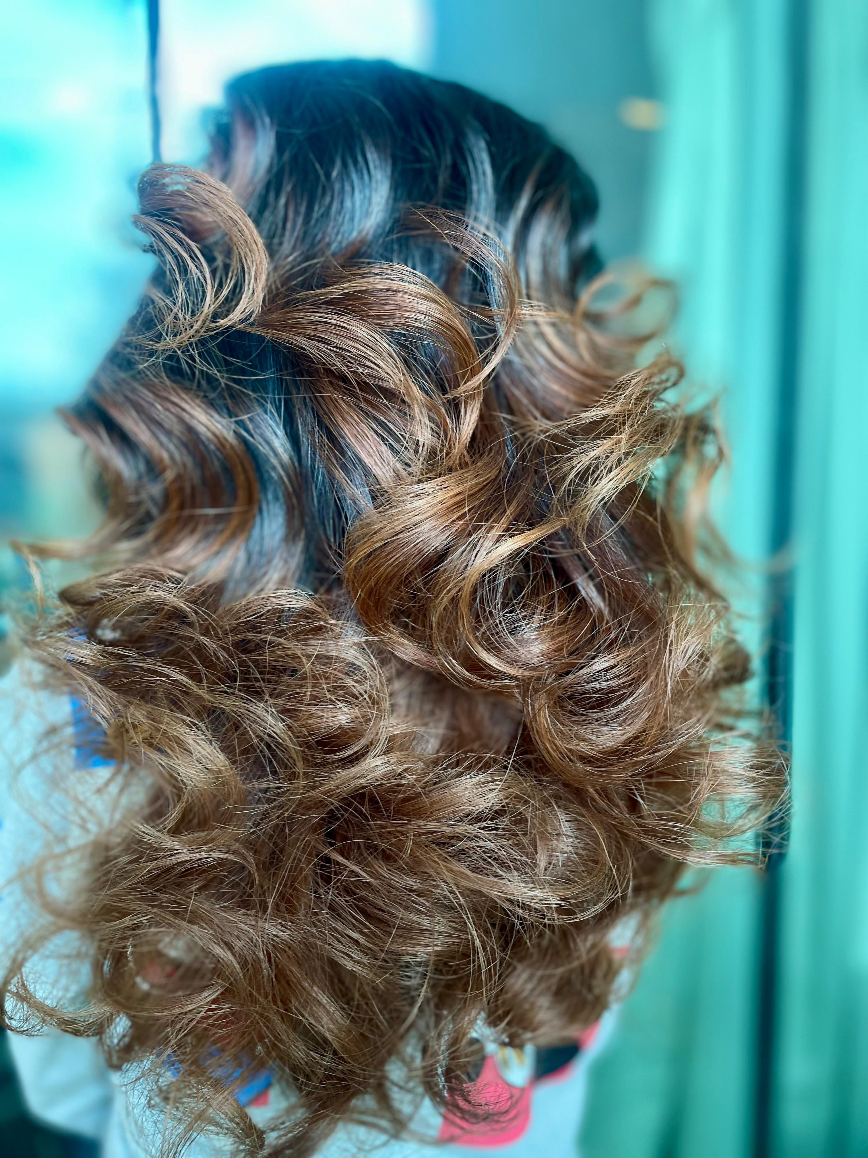 Warm chestnut tones on long layers